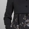 Пальто со встречными складками и вышитой юбкой