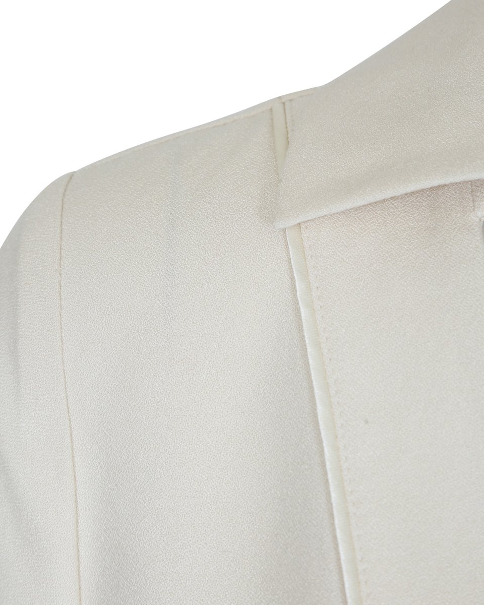 Блуза молочного цвета с удлиненной спинкой