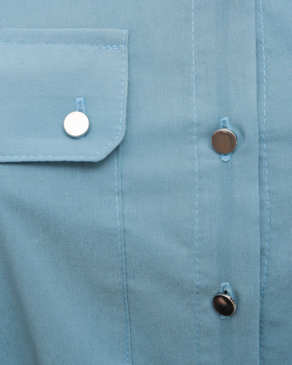 Комбинезон с накладными карманами голубого цвета