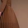 Пальто бежевого цвета с юбкой-плиссе