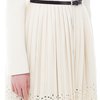 Пальто молочного цвета с пышной юбкой плиссе и фестонами