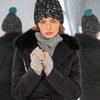 Зимнее пальто черного цвета с меховым воротником