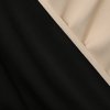 Платье бежевого цвета с расклешенной асимметричной юбкой