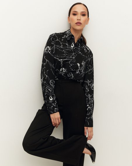 Блуза удлиненная черного цвета в стиле casual
