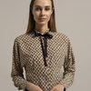 Блуза летучая мышь бежевого цвета с принтом