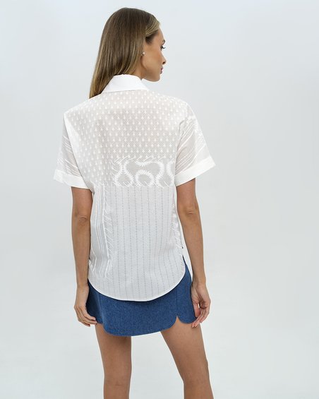 Блуза удлиненная белого цвета в винтажном стиле
