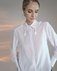 Белая блуза с кисточками на воротнике www.EkaterinaSmolina.ru
